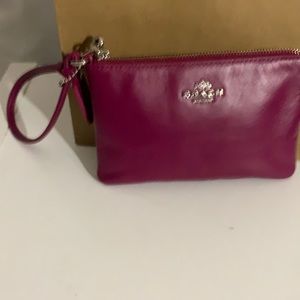 Coach Fuchsia leather wristlet